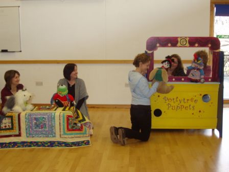 Teachers make puppets and perform with them